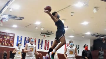 Menomonee Falls guard Seth Trimble throws down a dunk against Marquette during a game on Dec. 2, 2020.Seth Trimble pic