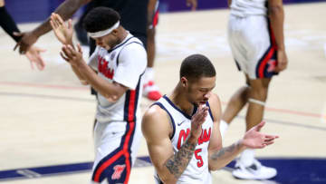 Feb 10, 2021; Oxford, Mississippi, USA; Mississippi Rebels forward KJ Buffen (5) claps after the Mississippi Rebels draw a foul during the second half against the Missouri Tigers at The Pavilion at Ole Miss. Mandatory Credit: Petre Thomas-USA TODAY Sports