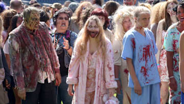 SAN DIEGO, CALIFORNIA - JULY 20: Fans attend The Walking Dead Walker Horde at Petco Park during Comic Con 2019 on July 20, 2019 in San Diego, California. (Photo by Jesse Grant/Getty Images for AMC)