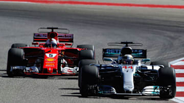 AUSTIN, TX - OCTOBER 22: Lewis Hamilton of Great Britain driving the (44) Mercedes AMG Petronas F1 Team Mercedes F1 WO8 leads Sebastian Vettel of Germany driving the (5) Scuderia Ferrari SF70H on track during the United States Formula One Grand Prix at Circuit of The Americas on October 22, 2017 in Austin, Texas. (Photo by Clive Mason/Getty Images)