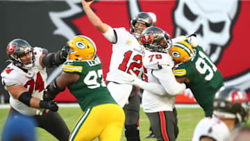 Oct 18, 2020; Tampa, Florida, USA; Tampa Bay Buccaneers quarterback Tom Brady (12) throws a pass against the Green Bay Packers during the third quarter of a NFL game at Raymond James Stadium. Mandatory Credit: Kim Klement-USA TODAY Sports