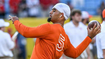 Clemson quarterback D.J. Uiagalelei(5) throws a ball warming up before the game with Georgia played in the Duke's Mayo Classic Sep 4, 2021; Charlotte, North Carolina, USA; at Bank of America Stadium.Ncaa Football Georgia At Clemson