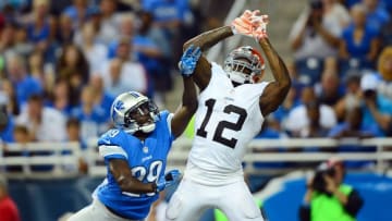 Aug 9, 2014; Detroit, MI, USA; Detroit Lions cornerback Cassius Vaughn (29) knocks a pass away from Cleveland Browns wide receiver Josh Gordon (12) during the second quarter at Ford Field. Mandatory Credit: Andrew Weber-USA TODAY Sports