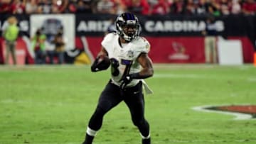 Oct 26, 2015; Glendale, AZ, USA; Baltimore Ravens running back Javorius Allen (37) runs with the ball after a catch in the first half against the Arizona Cardinals at University of Phoenix Stadium. Mandatory Credit: Matt Kartozian-USA TODAY Sports
