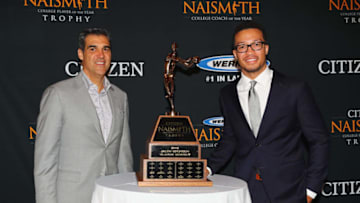 SAN ANTONIO, TX - APRIL 01: 2018 Citizen Naismith Men's College Player of the Year Jalen Brunson of the Villanova Wildcats poses with head coach Jay Wright and the 2018 Citizen Naismith Men's College Player of the Year trophy during the 2018 Naismith Awards Brunch at the Pearl Stable on April 1, 2018 in San Antonio, Texas. (Photo by Tim Bradbury/Getty Images)