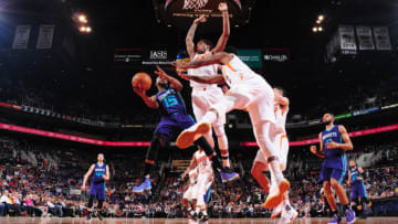 PHOENIX, AZ - MARCH 2: Kemba Walker #15 of the Charlotte Hornets goes for a lay up against the Charlotte Hornets during the game on March 2, 2017 at Talking Stick Resort Arena in Phoenix, Arizona. NOTE TO USER: User expressly acknowledges and agrees that, by downloading and or using this photograph, user is consenting to the terms and conditions of the Getty Images License Agreement. Mandatory Copyright Notice: Copyright 2017 NBAE (Photo by Barry Gossage/NBAE via Getty Images)
