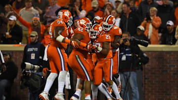 Nov 26, 2016; Clemson, SC, USA; Clemson Tigers running back C.J. Fuller (27) celebrates with teammates after scoring a touchdown during the third quarter against the South Carolina Gamecocks at Clemson Memorial Stadium. Mandatory Credit: Tommy Gilligan-USA TODAY Sports