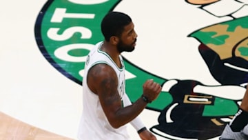 BOSTON, MA - NOVEMBER 16: Kyrie Irving #11 of the Boston Celtics celebrates defeating the Toronto Raptors 123-116 in overtime at TD Garden on November 16, 2018 in Boston, Massachusetts. (Photo by Tim Bradbury/Getty Images)