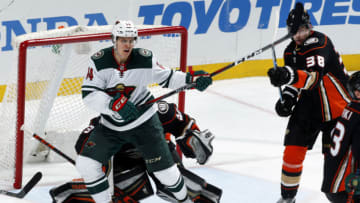 ANAHEIM, CA - APRIL 4: Joel Eriksson Ek #14 of the Minnesota Wild battles front of the net against Derek Grant #38 of the Anaheim Ducks during the game on April 4, 2018 at Honda Center in Anaheim, California. (Photo by Debora Robinson/NHLI via Getty Images)