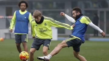 MADRID, SPAIN - DECEMBER 29: Martin Odegaard (L) and Daniel Carvajal of Real Madrid in action during a training session at Valdebebas training ground on December 29, 2015 in Madrid, Spain. (Photo by Angel Martinez/Real Madrid via Getty Images)