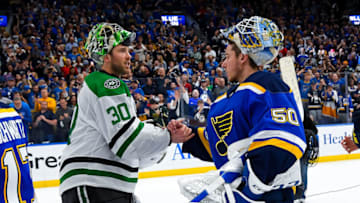 ST. LOUIS, MO - MAY 7: Ben Bishop #30 of the Dallas Stars and Jordan Binnington #50 of the St. Louis Blues shake hands after Game Seven of the Western Conference Second Round during the 2019 NHL Stanley Cup Playoffs at Enterprise Center on May 7, 2019 in St. Louis, Missouri. (Photo by Scott Rovak/NHLI via Getty Images)
