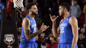 Mar 3, 2015; Athens, GA, USA; Kentucky Wildcats forward Karl-Anthony Towns (12) reacts with forward Willie Cauley-Stein (15) against the Georgia Bulldogs at Stegeman Coliseum. Kentucky defeated Georgia 72-64. Mandatory Credit: Dale Zanine-USA TODAY Sports