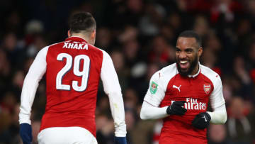 LONDON, ENGLAND - JANUARY 24: Granit Xhaka of Arsenal (L) celebtrates scoring his sides second goal with the 1st goalscorer Alexandre Lacazette during the Carabao Cup Semi-Final Second Leg at Emirates Stadium on January 24, 2018 in London, England. (Photo by Julian Finney/Getty Images)
