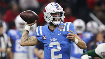 NEW ORLEANS, LOUISIANA - JANUARY 01: Matt Corral #2 of the Mississippi Rebels throws a pass against the Baylor Bears during the first quarter in the Allstate Sugar Bowl at Caesars Superdome on January 01, 2022 in New Orleans, Louisiana. (Photo by Sean Gardner/Getty Images)