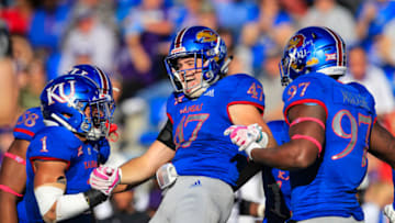 LAWRENCE, KS - OCTOBER 27: Keith Loneker Jr. #47 of the Kansas Jayhawks celebrates intercepting the ball against the TCU Horned Frogs in the third quarter at Memorial Stadium on October 27, 2018 in Lawrence, Kansas. (Photo by Brian Davidson/Getty Images)