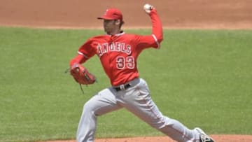 Jun 19, 2014; Cleveland, OH, USA; Los Angeles Angels starting pitcher C.J. Wilson (33) delivers in the second inning against the Cleveland Indians at Progressive Field. Mandatory Credit: David Richard-USA TODAY Sports