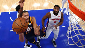 DETROIT, MI - JANUARY 24: Rudy Gobert #27 of the Utah Jazz gets to the basket past Andre Drummond #0 of the Detroit Pistons during the second half at Little Caesars Arena on January 24, 2018 in Detroit, Michigan. Utah won the game 98-95 in overtime. NOTE TO USER: User expressly acknowledges and agrees that, by downloading and or using this photograph, User is consenting to the terms and conditions of the Getty Images License Agreement. (Photo by Gregory Shamus/Getty Images)