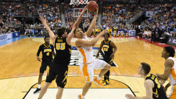 COLUMBUS, OH - MARCH 24: Grant Williams #2 of the Tennessee Volunteers shoots over Luka Garza #55 of the Iowa Hawkeyes in the second round of the 2019 NCAA Men's Basketball Tournament held at Nationwide Arena on March 24, 2019 in Columbus, Ohio. (Photo by Jamie Schwaberow/NCAA Photos via Getty Images)