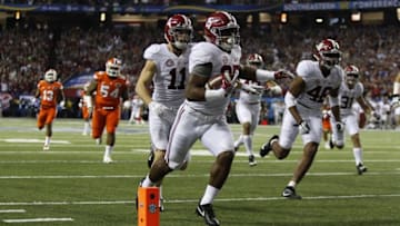 Dec 3, 2016; Atlanta, GA, USA; Alabama Crimson Tide running back Joshua Jacobs (25) returns a blocked punt for a touchdown against the Florida Gators during the first quarter of the SEC Championship college football game at Georgia Dome. Mandatory Credit: Brett Davis-USA TODAY Sports