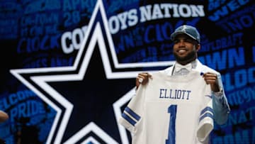 CHICAGO, IL - APRIL 28: Ezekiel Elliott of Ohio State holds up a jersey after being picked