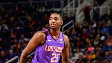 PHOENIX, AZ - NOVEMBER 30: Mikal Bridges #25 of the Phoenix Suns handles the ball against the Orlando Magic on November 30, 2018 at Talking Stick Resort Arena in Phoenix, Arizona. NOTE TO USER: User expressly acknowledges and agrees that, by downloading and/or using this photograph, user is consenting to the terms and conditions of the Getty Images License Agreement. Mandatory Copyright Notice: Copyright 2018 NBAE (Photo by Barry Gossage/NBAE via Getty Images)