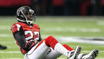 Dec 30, 2012; Atlanta, GA, USA; Atlanta Falcons cornerback Asante Samuel (22) sits on the turf after an injury in the first half against the Tampa Bay Buccaneers at the Georgia Dome. Mandatory Credit: Daniel Shirey-USA TODAY Sports