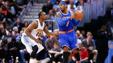 Mar 8, 2016; Denver, CO, USA; New York Knicks forward Carmelo Anthony (7) controls the ball against Denver Nuggets forward Darrell Arthur (00) in the first quarter at the Pepsi Center. Mandatory Credit: Isaiah J. Downing-USA TODAY Sports