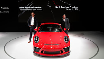 NEW YORK, NY - APRIL 12: Porsche Cars North America Chief Executive Officer Klaus Zellmer (R) poses with a 2018 Porsche 911 GT3 during a presentation at the New York International Auto Show, April 12, 2017 at the Jacob K. Javits Convention Center in New York City. The New York International Auto Show will open to the public starting Friday April 14 and run through April 23. (Photo by Drew Angerer/Getty Images)