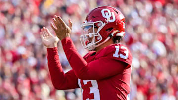 Nov 20, 2021; Norman, Oklahoma, USA; Oklahoma Sooners quarterback Caleb Williams (13) reacts after a touchdown during the fourth quarter against the Iowa State Cyclones at Gaylord Family-Oklahoma Memorial Stadium. Mandatory Credit: Kevin Jairaj-USA TODAY Sports