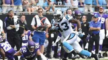 Sep 25, 2016; Charlotte, NC, USA; Carolina Panthers running back Fozzy Whittaker (43) with the ball as Minnesota Vikings free safety Harrison Smith (22) defends in the second quarter at Bank of America Stadium. Mandatory Credit: Bob Donnan-USA TODAY Sports