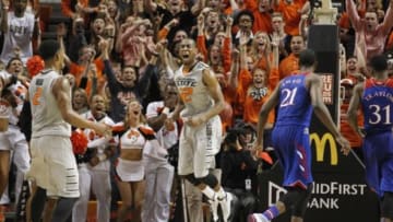 Mar 1, 2014; Stillwater, OK, USA; Oklahoma State Cowboys guard Markel Brown (22) celebrates scoring a basket during the second half against the Kansas Jayhawks at Gallagher-Iba Arena. Oklahoma State beat Kansas 72-65. Mandatory Credit: Tim Heitman-USA TODAY Sports