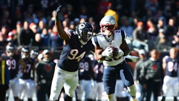 CHICAGO, IL - OCTOBER 21: James White #28 of the New England Patriots carries the football against Leonard Floyd #94 of the Chicago Bears in the third quarter at Soldier Field on October 21, 2018 in Chicago, Illinois. (Photo by Stacy Revere/Getty Images)