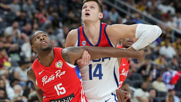 LAS VEGAS, NEVADA - AUGUST 07: Timajh Parker-Rivera #15 of Puerto Rico and Walker Kessler #14 of the United States vie for position on a free throw rebound in the second half of a 2023 FIBA World Cup exhibition game at T-Mobile Arena on August 07, 2023 in Las Vegas, Nevada. The United States defeated Puerto Rico 117-74. (Photo by Ethan Miller/Getty Images)