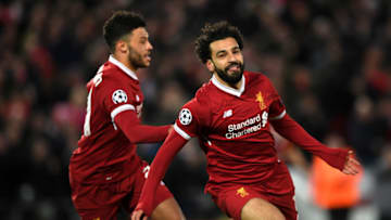 LIVERPOOL, ENGLAND - APRIL 04: Mohamed Salah of Liverpool celebrates after scoring his sides first goal during the UEFA Champions League Quarter Final Leg One match between Liverpool and Manchester City at Anfield on April 4, 2018 in Liverpool, England. (Photo by Shaun Botterill/Getty Images)