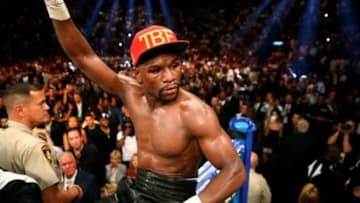 May 3, 2014; Las Vegas, NV, USA; Floyd Mayweather Jr. celebrates after defeating Marcos Maidana (not pictured) during their fight at the MGM Grand. Mandatory Credit: Mark J. Rebilas-USA TODAY Sports
