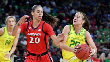 LAS VEGAS, NEVADA - MARCH 07: Sabrina Ionescu #20 of the Oregon Ducks drives to the basket against Dominique McBryde #20 of the Arizona Wildcats during the Pac-12 Conference women’s basketball tournament semifinals at the Mandalay Bay Events Center on March 7, 2020 in Las Vegas, Nevada. The Ducks defeated the Wildcats 88-70. (Photo by Ethan Miller/Getty Images)