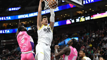 SALT LAKE CITY, UTAH - OCTOBER 16: Walker Kessler #24 of the Utah Jazz shoots over Mangok Mathiang #8 and Zylan Cheatham #45 of the New Zealand Breakers during the first half of a preseason game at Delta Center on October 16, 2023 in Salt Lake City, Utah. NOTE TO USER: User expressly acknowledges and agrees that, by downloading and or using this photograph, User is consenting to the terms and conditions of the Getty Images License Agreement. (Photo by Alex Goodlett/Getty Images)