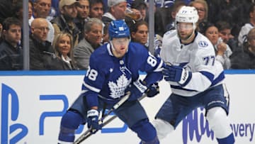 TORONTO, CANADA - APRIL 18: Victor Hedman #77 of the Tampa Bay Lightning tries to contain William Nylander #88 of the Toronto Maple Leafs during Game One of the First Round of the 2023 Stanley Cup Playoffs at Scotiabank Arena on April 18, 2023 in Toronto, Ontario, Canada. The Lightning defeated the Maple Leafs 7-3. (Photo by Claus Andersen/Getty Images)