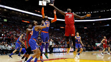 Dewayne Dedmon #21 of the Miami Heat goes up against Taj Gibson #67 of the New York Knicks(Photo by Cliff Hawkins/Getty Images)