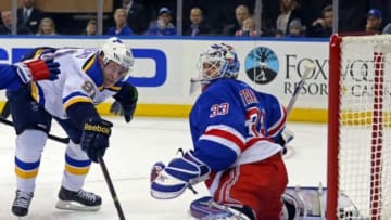 Nov 3, 2014; New York, NY, USA; St. Louis Blues right wing Vladimir Tarasenko (91) scores a goal past New York Rangers goalie Cam Talbot (33) during the second period at Madison Square Garden. Mandatory Credit: Adam Hunger-USA TODAY Sports