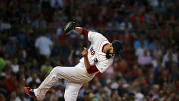 BOSTON, MA - AUGUST 29: David Price #24 of the Boston Red Sox is hit by a ball off the bat of Austin Dean of the Miami Marlins in the third inning at Fenway Park on August 29, 2018 in Boston, Massachusetts. Price was injured on the play.(Photo by Jim Rogash/Getty Images)