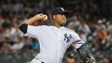 Sep 28, 2015; Bronx, NY, USA; New York Yankees pitcher Ivan Nova (47) delivers a pitch during the first inning of the game against the Boston Red Sox at Yankee Stadium. The Red Sox won 5-1. Mandatory Credit: Gregory J. Fisher-USA TODAY Sports