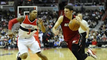 Mar 6, 2015; Washington, DC, USA; Miami Heat guard Tyler Johnson (8) dribbles the ball past Washington Wizards guard Bradley Beal (3) during the second half at Verizon Center. Mandatory Credit: Brad Mills-USA TODAY Sports