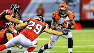 Aug 8, 2013; Atlanta, GA, USA; Cincinnati Bengals running back Giovani Bernard (25) runs the ball past Atlanta Falcons defensive back Shann Schillinger (29) in the first half at the Georgia Dome. Mandatory Credit: Daniel Shirey-USA TODAY Sports
