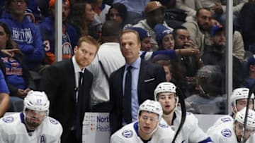 UNIONDALE, NEW YORK - NOVEMBER 01: Head coach Jon Cooper of the Tampa Bay Lightning (R) handles the bench during the game against the New York Islanders at NYCB Live's Nassau Coliseum on November 01, 2019 in Uniondale, New York. The Islanders defeated the Lightning 5-2. (Photo by Bruce Bennett/Getty Images)