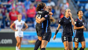 BRIDGEVIEW, IL - JUNE 23: Chicago Red Stars's Danielle Colaprico (24) and Chicago Red Stars's Katie Naughton (5) embrace after scoring a goal against the Utah Royals FC on June 23, 2018 at Toyota Park in Bridgeview, Illinois. (Photo by Quinn Harris/Icon Sportswire via Getty Images)
