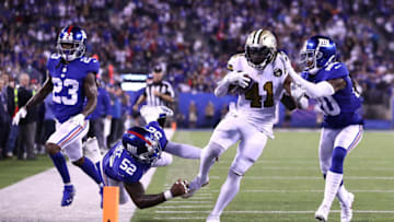 EAST RUTHERFORD, NJ - SEPTEMBER 30: Alvin Kamara #41 of the New Orleans Saints rushes to the end zone before scoring a touchdown against the New York Giants during the fourth quarter at MetLife Stadium on September 30, 2018 in East Rutherford, New Jersey. (Photo by Al Bello/Getty Images)