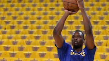 May 27, 2015; Oakland, CA, USA; Golden State Warriors forward Harrison Barnes (40) warms up before game five of the Western Conference Finals of the NBA Playoffs against the Houston Rockets at Oracle Arena. The Warriors defeated the Rockets 104-90 to advance to the NBA Finals. Mandatory Credit: Kyle Terada-USA TODAY Sports