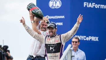 NEW YORK, NY - JULY 15: Sir Richard Branson and Sam Bird (GBR), DS Virgin Racing, Spark-Citroen, Virgin DSV-02, spray the champagne on the podium during the New York City ePrix, ninth round of the 2016/17 FIA Formula E Series on July 15, 2017 in Brooklyn, New York City, NY, USA. (Photo by Andrew Ferraro/LAT Images)