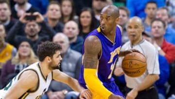 Jan 16, 2016; Salt Lake City, UT, USA; Utah Jazz guard Raul Neto (25) defends against Los Angeles Lakers forward Kobe Bryant (24) during the first quarter at Vivint Smart Home Arena. Mandatory Credit: Russ Isabella-USA TODAY Sports